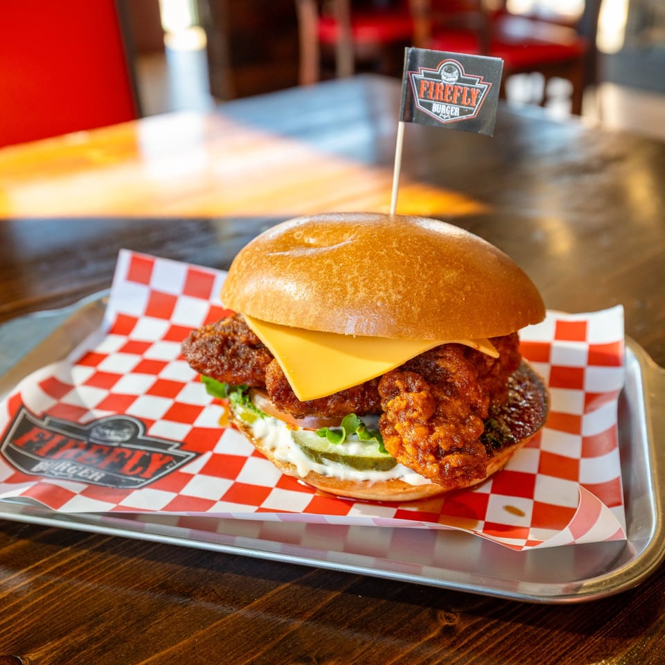 Crispy chicken burger on a tray