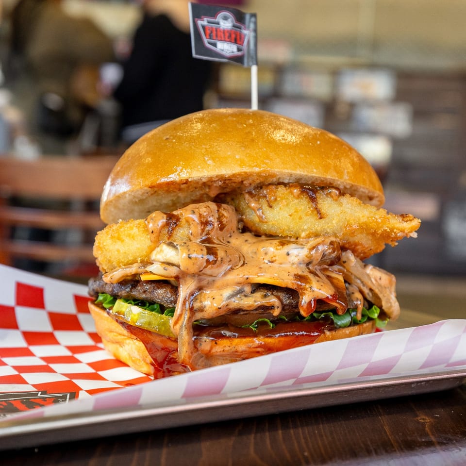 Classic burger served on checkered paper